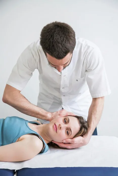 Framed Print : Structural osteopathy session in a woman suffering from neck pain Framed Print : Structural osteopathy session in a woman suffering from neck pain