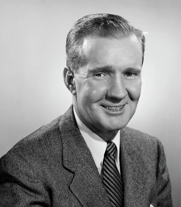 Framed Print : Studio portrait of businessman smiling Framed Print : Studio portrait of businessman smiling