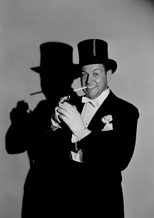 Framed Print : Studio portrait of man wearing tophat, smoking Framed Print : Studio portrait of man wearing tophat, smoking