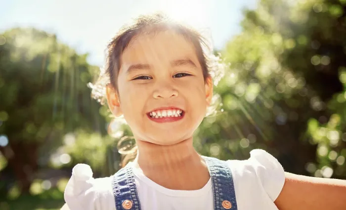 Framed Print : Summer, sunshine and portrait of Asian child in the park smile on face Framed Print : Summer, sunshine and portrait of Asian child in the park smile on face