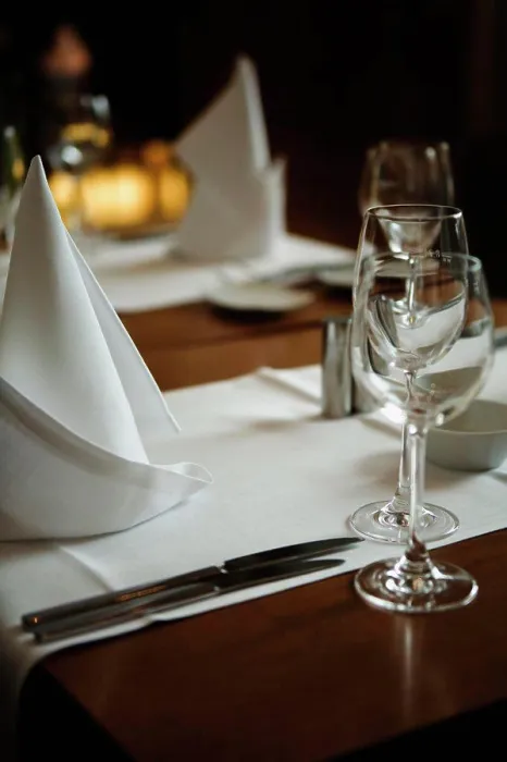 Framed Print : A table set for dinner in a restaurant Framed Print : A table set for dinner in a restaurant