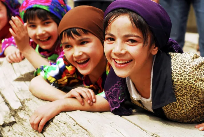 Framed Print : Tajikistan, Penjakent, group of local girls in traditional dress posing and playing by the river on wooden bridge Framed Print : Tajikistan, Penjakent, group of local girls in traditional dress posing and playing by the river on wooden bridge