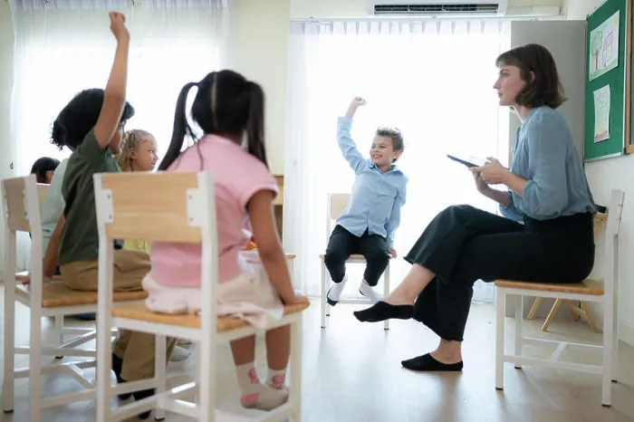 Framed Print : Teacher and students, Learn and study in a classroom of school where youngsters sit and listen attentively Framed Print : Teacher and students, Learn and study in a classroom of school where youngsters sit and listen attentively