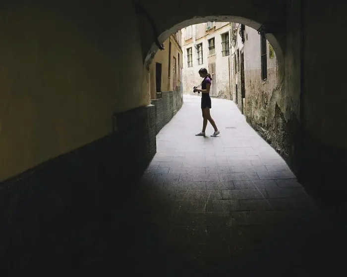 Framed Print : Teenage girl composing photo with digital camera, Gothic Quarter, Barcelona, Spain