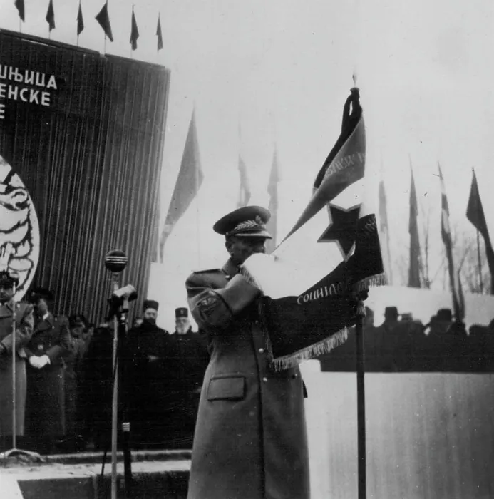 Framed Print : Tito Kisses The Flag -- At a ceremony to mark the tenth anniversary of the Yugoslav People's Army Framed Print : Tito Kisses The Flag -- At a ceremony to mark the tenth anniversary of the Yugoslav People's Army