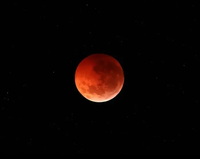 Framed Print : The totality phase of a lunar eclipse during the 2010 solstice Framed Print : The totality phase of a lunar eclipse during the 2010 solstice