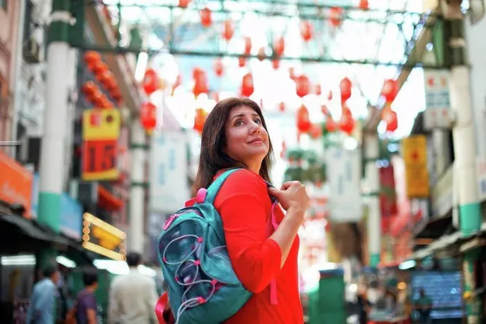 Framed Print : Tourist sightseeing in Chinatown, Kuala Lumpur, Malaysia