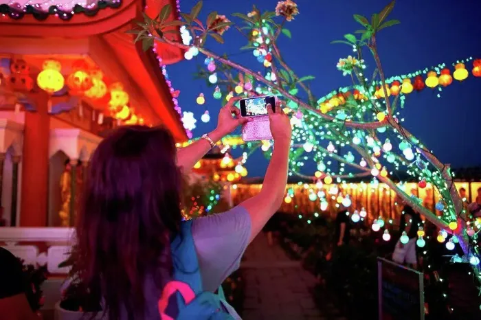 Framed Print : Tourist taking photograph of light decorations, Kek Lok Si Temple, Penang Island, Malaysia Framed Print : Tourist taking photograph of light decorations, Kek Lok Si Temple, Penang Island, Malaysia