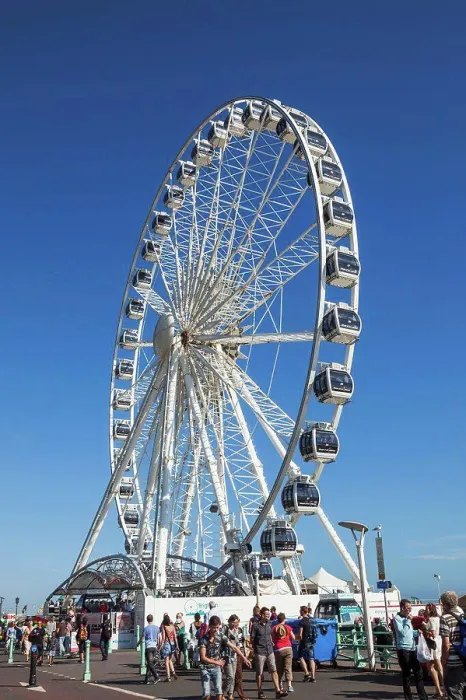 Framed Print : Tourists near a ferris wheel, Brighton Wheel, Brighton, East Sussex, England