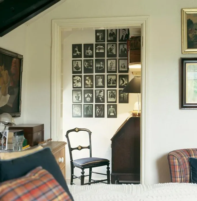 Framed Print : Townhouse bedroom with view through doorway of collection of black Framed Print : Townhouse bedroom with view through doorway of collection of black