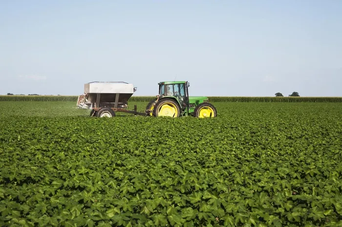 Framed Print : Tractor-Pulled Bulk Fertilizer Application Broadcasting Urea Fertilizer (Source Of Nitrogen)