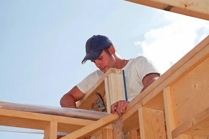 Framed Print : tradesman working on framing for new home construction, st. albert alberta canada Framed Print : tradesman working on framing for new home construction, st. albert alberta canada