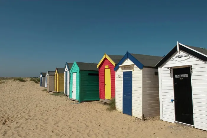 Framed Print : Traditional beach huts in the sand dunes at Southwold, Suffolk, UK Framed Print : Traditional beach huts in the sand dunes at Southwold, Suffolk, UK