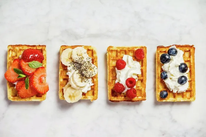 Framed Print : Traditional belgian waffles with whipped cream and fresh fruits and berries on white marble background Framed Print : Traditional belgian waffles with whipped cream and fresh fruits and berries on white marble background