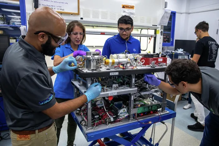 Framed Print : The Trash to Gas team members prepare flight hardware for NASAs Orbital Syngas Commodity Augmentation Reactor Framed Print : The Trash to Gas team members prepare flight hardware for NASAs Orbital Syngas Commodity Augmentation Reactor