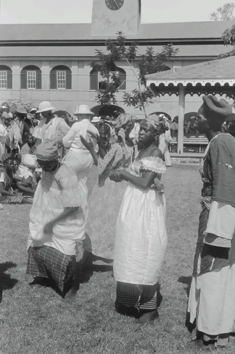 Framed Print : Travel photos Haiti. Event Square. View with dancing and singing women Framed Print : Travel photos Haiti. Event Square. View with dancing and singing women