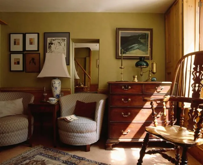 Framed Print : Tub armchairs and antique chest-of-drawers in traditional cottage living room Framed Print : Tub armchairs and antique chest-of-drawers in traditional cottage living room