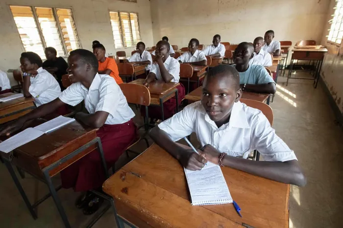 Framed Print : Uganda. Students learn in a small classroom. (Editorial Use Only) Framed Print : Uganda. Students learn in a small classroom. (Editorial Use Only)