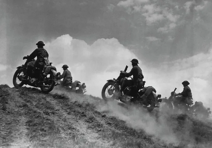 Framed Print : U.S. Soldier Cyclists Go 'Over The Top' - Cumulus clouds above