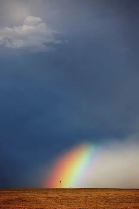 Framed Print : USA, Colorado, Rainbow, and curtains of rain at base of powerful thunderstorm, ending at lone windmill on open plains
