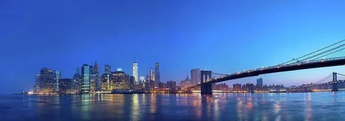 Framed Print : USA, New York City, Manhattan, panorama of financial district with Brooklyn Bridge at dawn