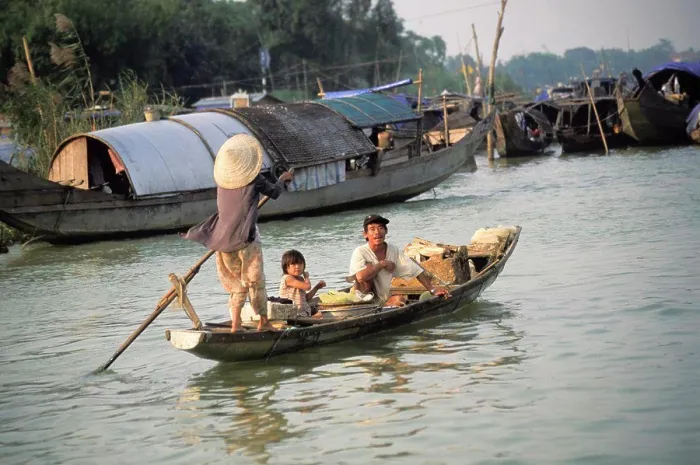 Framed Print : Vietnam. Hue. Perfume River. Family On Boat Framed Print : Vietnam. Hue. Perfume River. Family On Boat
