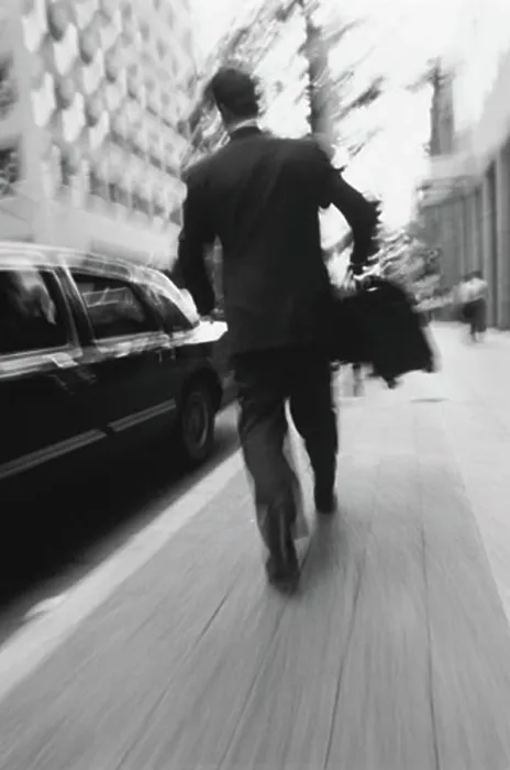 Framed Print : Back View of Businessman Walking On Street Carrying Briefcase Framed Print : Back View of Businessman Walking On Street Carrying Briefcase