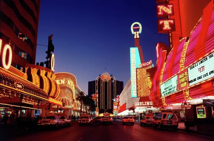 Framed Print : Vintage photo of Neon lights of casinos and restaurants lit up at night Framed Print : Vintage photo of Neon lights of casinos and restaurants lit up at night