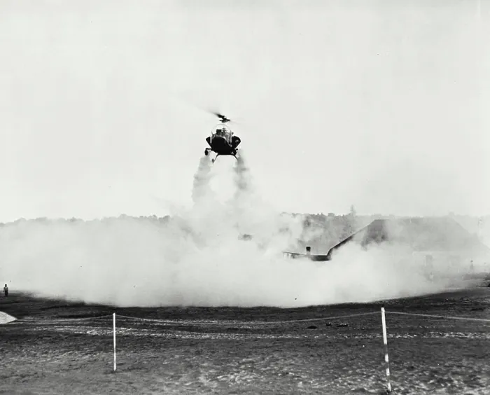 Framed Print : Vintage photograph. Bell helicopter performing Black fly fogging operations Framed Print : Vintage photograph. Bell helicopter performing Black fly fogging operations