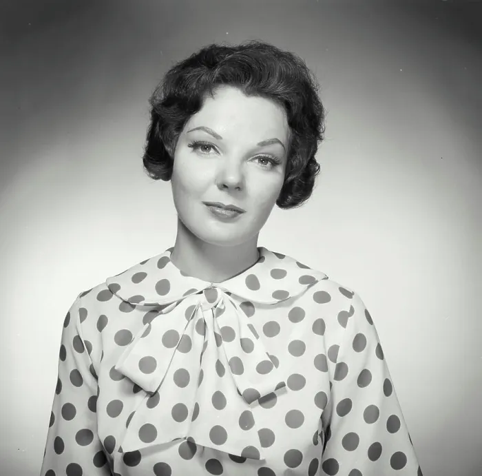 Framed Print : Vintage Photograph. Brunette woman wearing polka dot blouse looking at camera Framed Print : Vintage Photograph. Brunette woman wearing polka dot blouse looking at camera