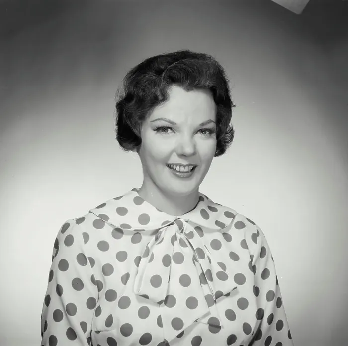 Framed Print : Vintage Photograph. Brunette woman wearing polka dot blouse looking at camera smiling Framed Print : Vintage Photograph. Brunette woman wearing polka dot blouse looking at camera smiling