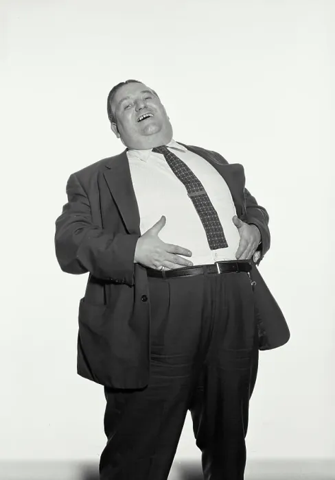 Framed Print : Vintage Photograph. Fat man wearing suit and tie laughing with hands on stomach Framed Print : Vintage Photograph. Fat man wearing suit and tie laughing with hands on stomach