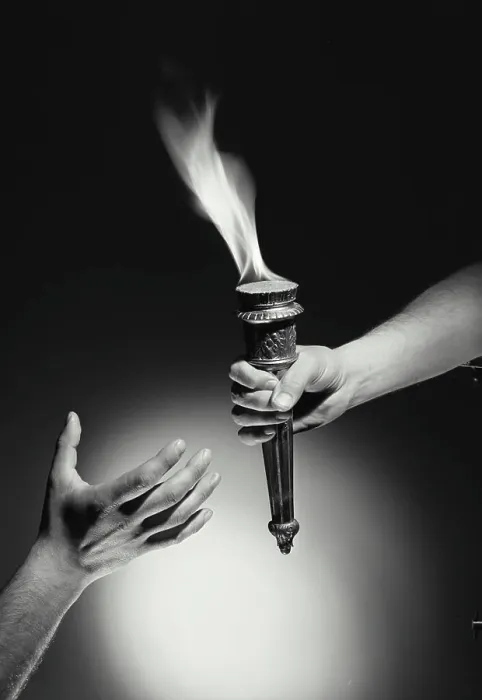 Framed Print : Vintage Photograph. Hand passing torch with flame to hand reaching up from bottom of frame with dark background, Frame 4 Framed Print : Vintage Photograph. Hand passing torch with flame to hand reaching up from bottom of frame with dark background, Frame 4