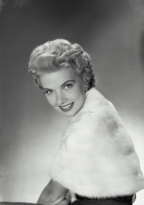 Framed Print : Vintage Photograph. June Kirby. Model Released. Portrait of woman in fur jacket smiling. Frame 1 Framed Print : Vintage Photograph. June Kirby. Model Released. Portrait of woman in fur jacket smiling. Frame 1