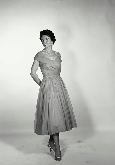 Framed Print : Vintage Photograph. Full length of a woman in a dress on white backdrop Framed Print : Vintage Photograph. Full length of a woman in a dress on white backdrop