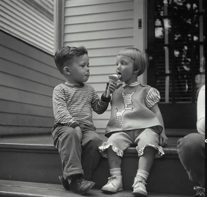Framed Print : Vintage Photograph. Little boy sharing his ice cream cone with little girl. Frame 1