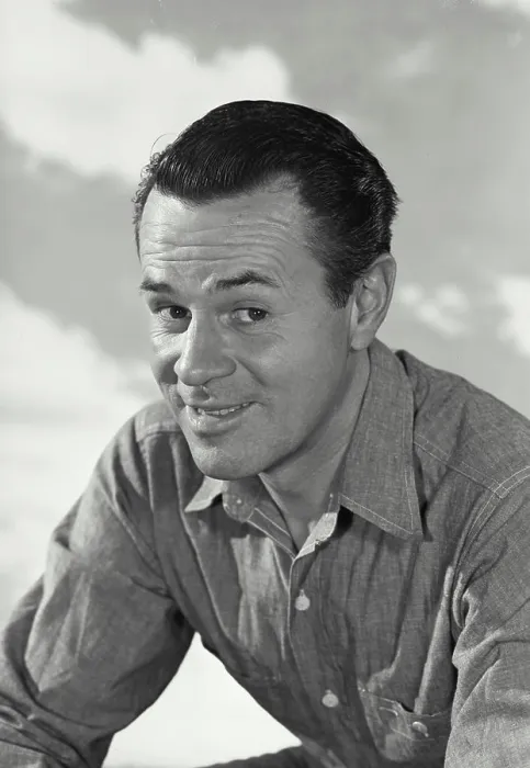 Framed Print : Vintage photograph. Man in button shirt smiling at camera Framed Print : Vintage photograph. Man in button shirt smiling at camera