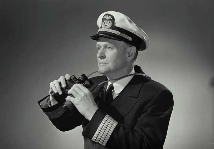 Framed Print : Vintage Photograph. Man in captains uniform holding binoculars around neck