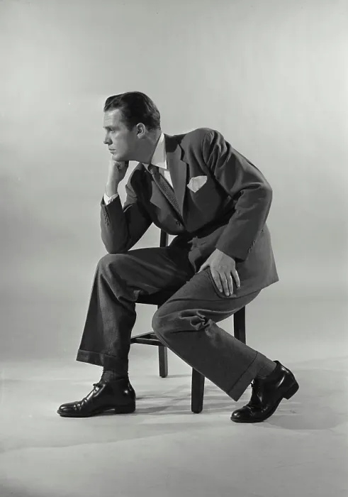 Framed Print : Vintage Photograph. Man in suit sittin gon chair with chin rested on fist