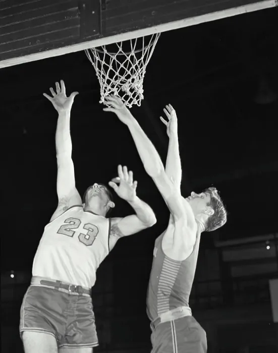 Framed Print : Vintage Photograph. Two men playing basketball jumping up for ball near basket Framed Print : Vintage Photograph. Two men playing basketball jumping up for ball near basket