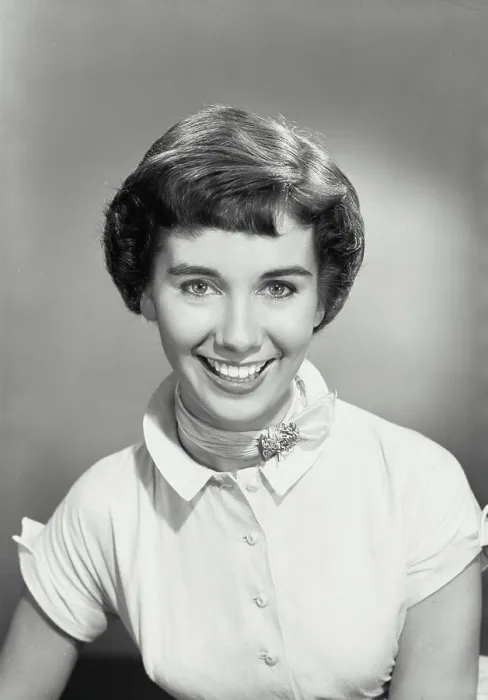 Framed Print : Vintage photograph. Portrait of brunette woman smiling wearing ribbon neck scarf Framed Print : Vintage photograph. Portrait of brunette woman smiling wearing ribbon neck scarf