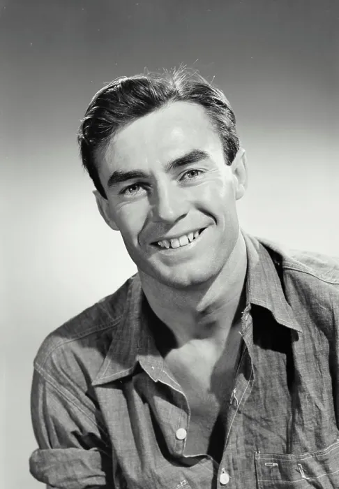 Framed Print : Vintage photograph. Portrait of man in button shirt smiling