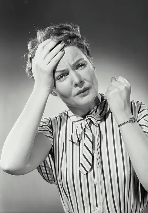 Framed Print : Vintage photograph. Portrait of woman in striped blouse with hand on forehead in pain Framed Print : Vintage photograph. Portrait of woman in striped blouse with hand on forehead in pain