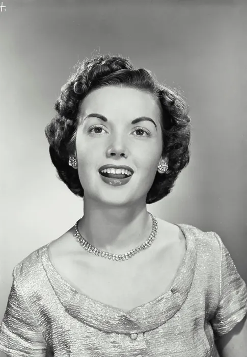 Framed Print : Vintage photograph. Portrait of young woman smiling. Model released Framed Print : Vintage photograph. Portrait of young woman smiling. Model released