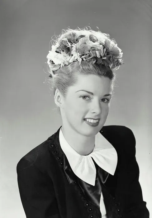 Framed Print : Vintage Photograph. Studio portrait of beautiful woman in jacket and earrings with flower headband Framed Print : Vintage Photograph. Studio portrait of beautiful woman in jacket and earrings with flower headband
