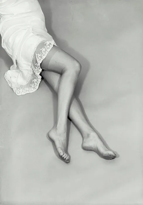 Framed Print : Vintage photograph. Waist down photo of woman in white nightgown with bare feet and legs. Model released Framed Print : Vintage photograph. Waist down photo of woman in white nightgown with bare feet and legs. Model released