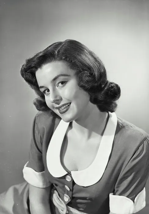 Framed Print : Vintage photograph. Woman in collared and button blouse smiling at camera