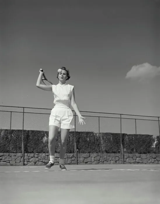 Framed Print : Vintage Photograph. Woman gets ready to hit tennis ball on court she is in the serving position