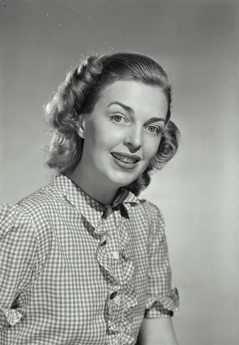 Framed Print : Vintage photograph. Woman wearing gingham blouse smiling Framed Print : Vintage photograph. Woman wearing gingham blouse smiling