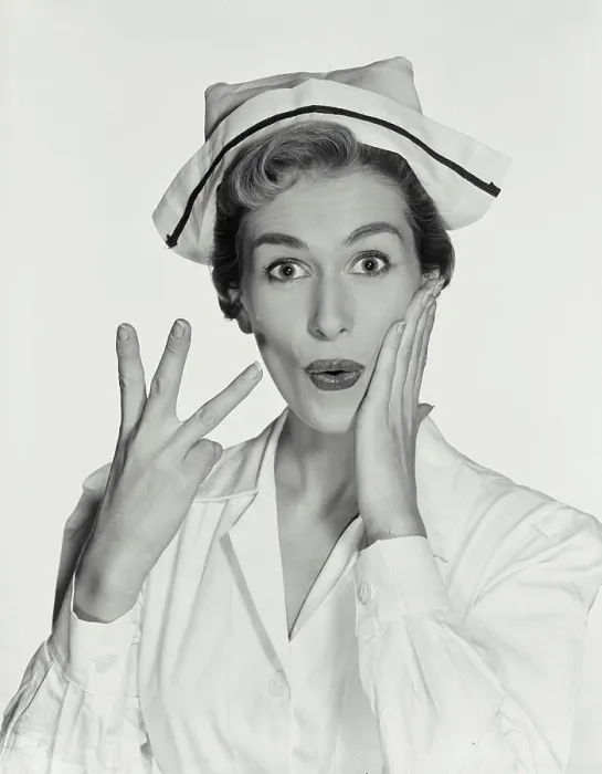Framed Print : Vintage Photograph. Woman wearing nurse uniform holding up three fingers on right hand